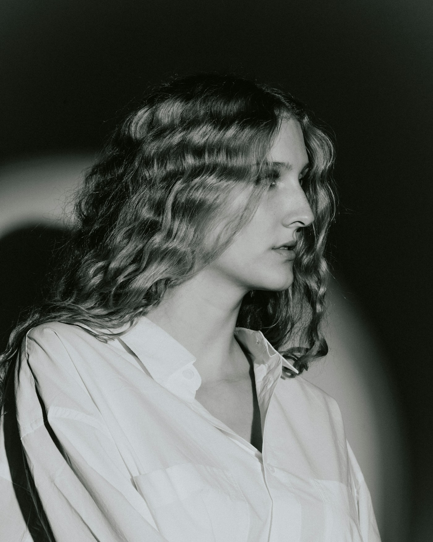 Editorial portrait of softly sculpted, waved hair